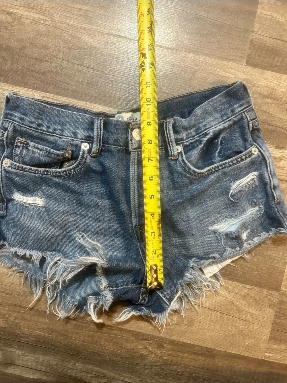 We The Free by Free People Frayed Blue Denim Cutoff Shorts size 24
